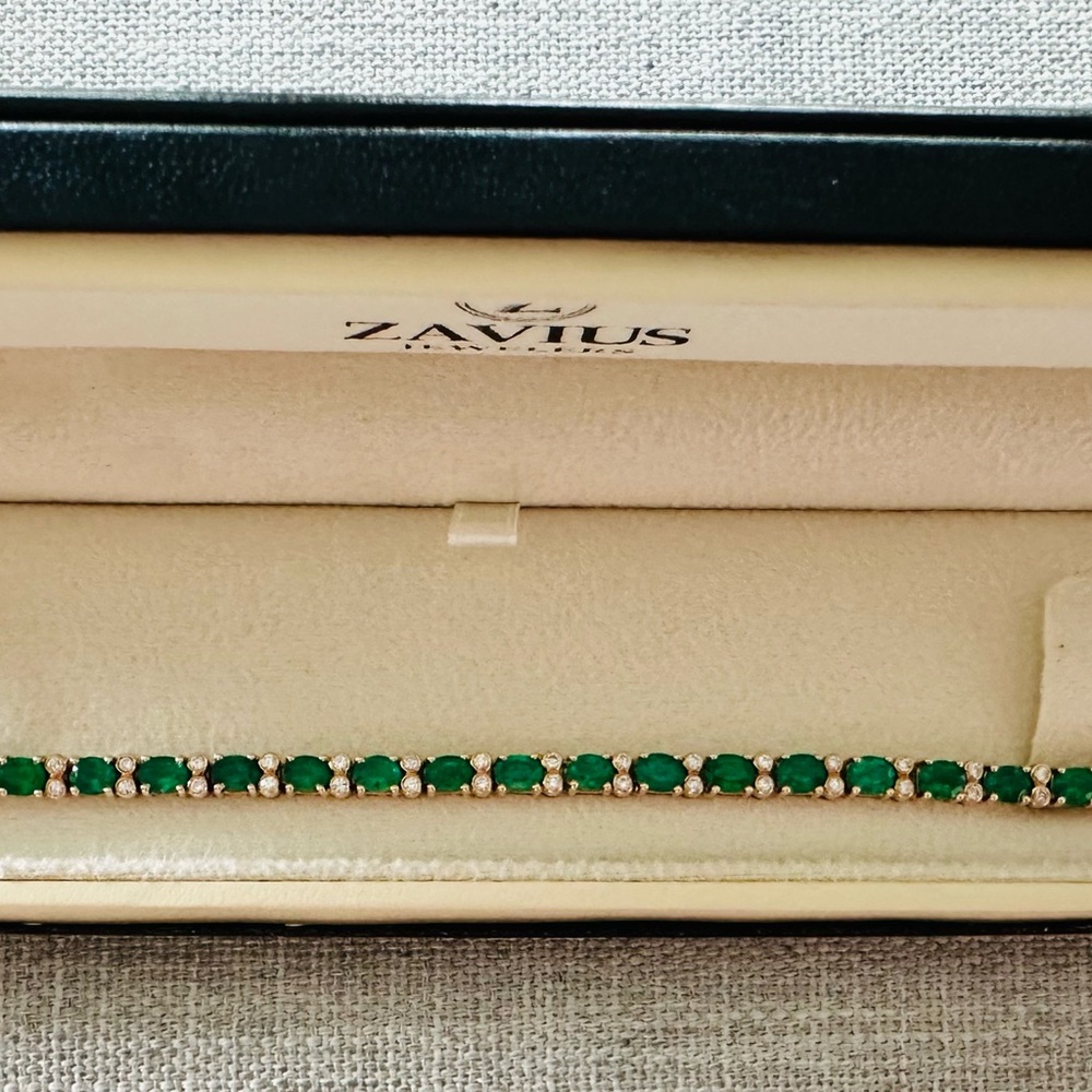 Genuine emerald and diamond tennis bracelet in 14 kt yellow gold